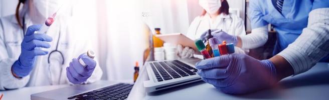 Medicine doctor hand working on a patients x-ray scans digital healthcare and connection with modern virtual screen interface icons, Medical technology and network concept. photo