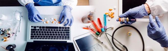 Medicine doctor hand working on a patients x-ray scans digital healthcare and connection with modern virtual screen interface icons, Medical technology and network concept. photo