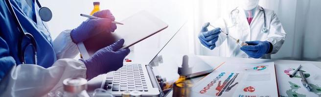 Medicine doctor and stethoscope touching icon medical network connection with modern interface on digital tablet in hospital background. Medical technology network concept photo