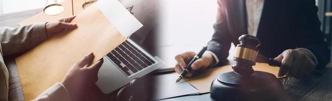 Business and lawyers discussing contract papers with brass scale on desk in office. Law, legal services, advice, justice and law concept picture with film grain effect photo