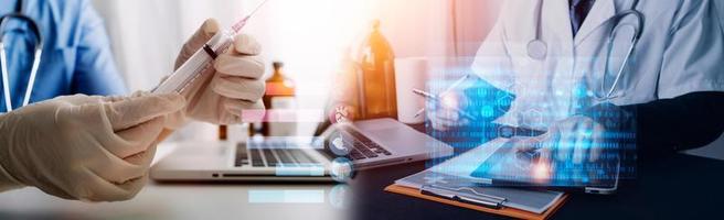Medicine doctor hand working on a patients x-ray scans digital healthcare and connection with modern virtual screen interface icons, Medical technology and network concept. photo
