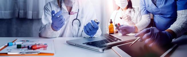 Medicine doctor hand working on a patients x-ray scans digital healthcare and connection with modern virtual screen interface icons, Medical technology and network concept. photo