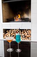 Two Cocktails with a fireplace photo