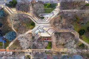 top view from drone of city park walkways and trees. Architecture element photo