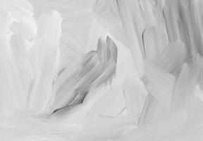 White abstract textured background painting. Monochrome light minimalistic artwork. Grunge black and white texture. Brush strokes on paper. photo