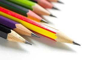 stack of pencils on white background photo