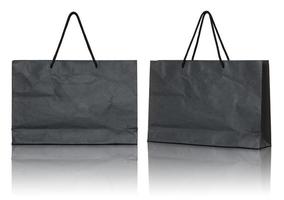 black paper bag isolated on white background photo