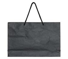 black paper bag isolated on white with clipping path photo