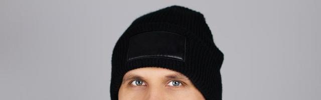 man in blank black winter hat isolated , mock up , copy space photo