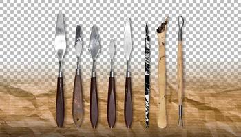 conjunto de espátulas de cuchillo de paleta diferentes aislado sobre fondo blanco. foto
