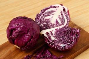 Purple cabbage ready to cook in the kitchen photo