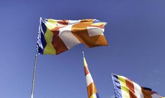 Waving colorful Buddhist Sri Lanlan Flag photo