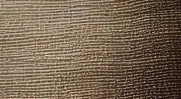 Linen like fabric texture in ocher and beiges tones, suitable for use on different surfaces such as ceramics, papers, graphic designs, wood, etc. photo