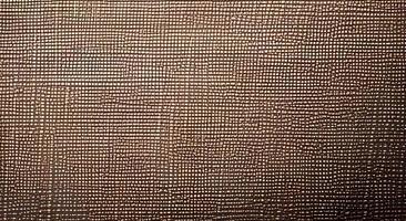 Close up of brown woven surface. It looks like the texture of linen. Dark abstract background from fabric. Textured braided middle-ground backdrop. Macro photo