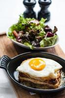 Breakfast menu with beautiful fried eggs and bread photo