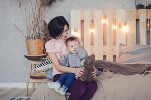 cheerful mother and daughter photo