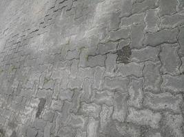 cracked and dirty brick paving roads photo