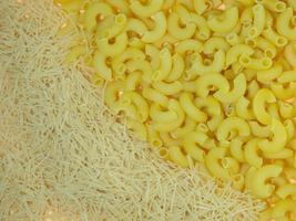 Noodles and pasta horns. Non-solid wheat products photo