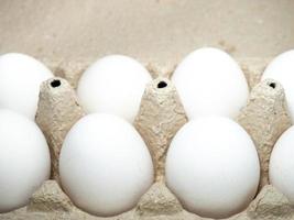 Eggs in a box. A dozen eggs. Kitchen. photo