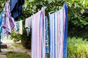 towels and linen drying in the courtyard photo