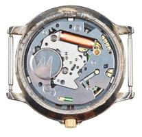 quartz wristwatch movement in old clock isolated photo