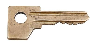 Una llave de puerta de latón para cerradura de cilindro foto