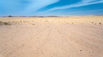 sandy landscape of Wadi Rum desert photo