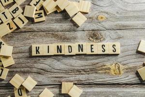 Kindness Word Written In Wooden Cube photo