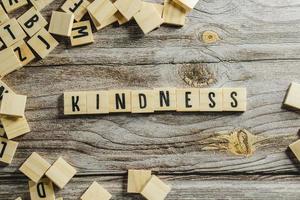Kindness Word Written In Wooden Cube photo