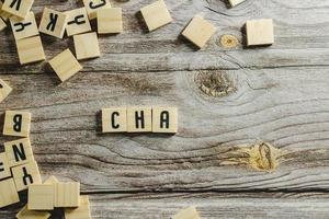 Change word cube on wood background ,English language learning concept photo