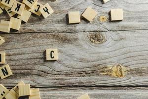 Change word cube on wood background ,English language learning concept photo