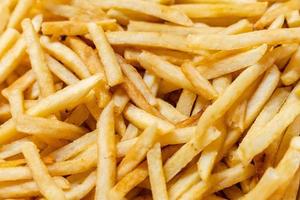 Yummy french fries as background photo