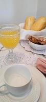 breakfast table with coffee and food photo