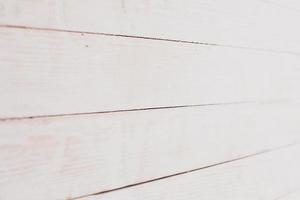 Vintage colored wood background texture with knots and nail holes. Old painted wood wall. Wooden dark horizontal boards. Front view with copy space. photo
