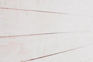 Vintage colored wood background texture with knots and nail holes. Old painted wood wall. Wooden dark horizontal boards. Front view with copy space. photo