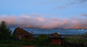 Beautiful gentle dawn in the village in spring photo