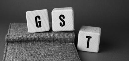 Words with GST , Business Concept idea photo