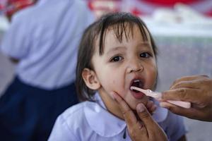 Concept of children cleaning teeth. photo