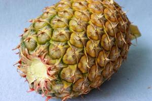 Fresh large pineapple isolated on a white background photo