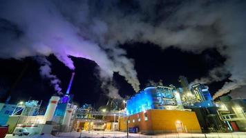 Norway, 2022 - Factory at Night Air Pollution From Industrial Smoke photo