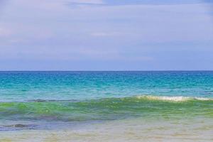 Naithon Beach bay turquoise clear water and waves Phuket Thailand. photo