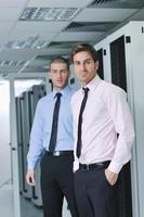 it engineers in network server room photo