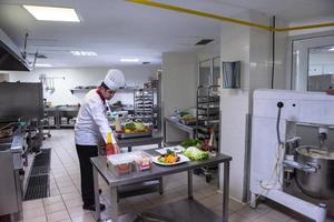 team cooks and chefs preparing meals photo