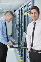 it engineers in network server room photo