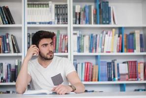 student study  in school library photo