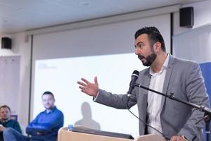 businessman giving presentations at conference room photo