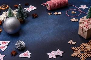 Christmas composition with gingerbread cookies, Christmas toys, pine cones and spices photo