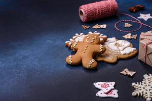 Christmas composition with gingerbread cookies, Christmas toys, pine cones and spices photo