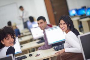 students group in computer lab classroom photo