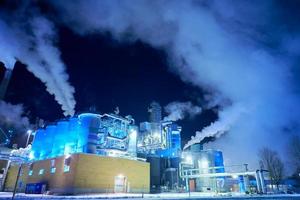 Norway, 2022 - Factory at Night Air Pollution From Industrial Smoke photo